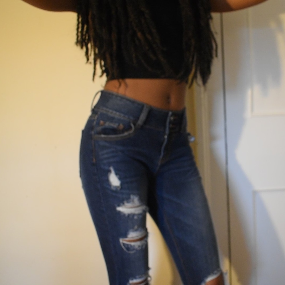 Mid Rise Ripped Skinny Jeans
